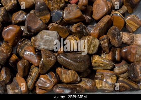 Das Tigerauge und Falkenauge Edelstein als natürliche Mineral Rock Muster Stockfoto