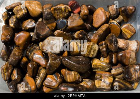 Das Tigerauge und Falkenauge Edelstein als natürliche Mineral Rock Muster Stockfoto