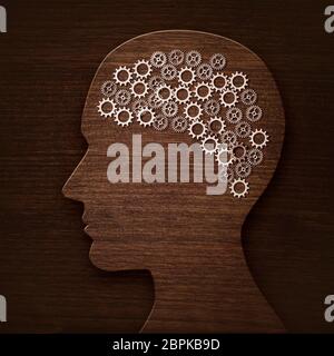 Gehirn Konzept aus Zahnrädern und Zahnrädern, Holzhintergrund Stockfoto