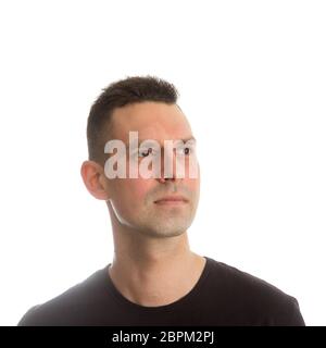 Hübscher lächelnd junger Mann nachschlagen Stockfoto