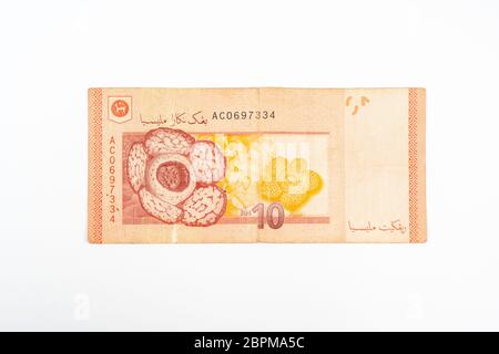 10 malaysische Ringgit Banknote auf eine weiße Fläche Stockfoto