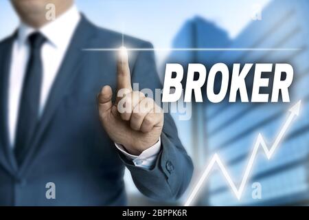 Makler-Touchscreen gesteuert Geschäftsmann. Stockfoto