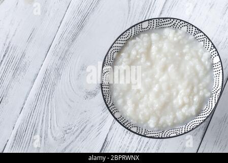 Schüssel congee - asiatische Reisbrei Stockfoto