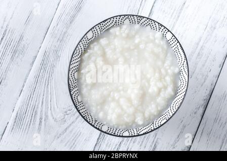 Schüssel congee - asiatische Reisbrei Stockfoto