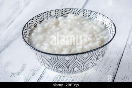 Schüssel congee - asiatische Reisbrei Stockfoto