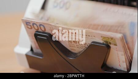 Geldzählmaschine für Hong Kong Dollar Stockfoto