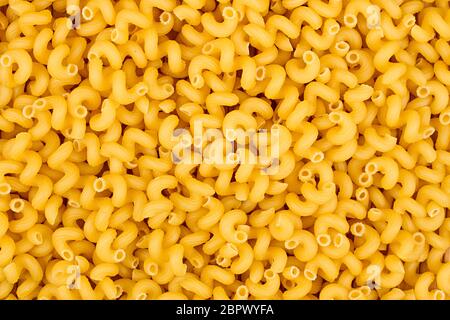 Textur von raw Cavatappi Cellentani Nudeln pasta italienisches Essen Makro Nahaufnahme Hintergrund Stockfoto