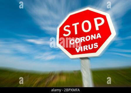 Halten Sie das Coronavirus-Zeichen an Stockfoto