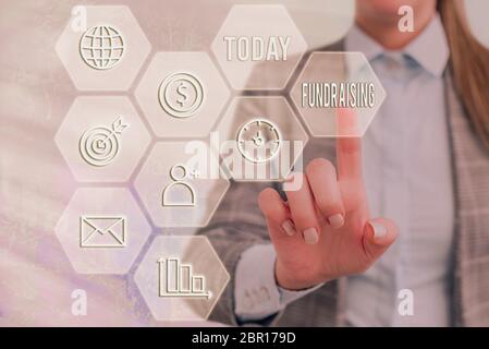 Text zeichen Fundraising angezeigt. Business Foto Text handeln, der das Sammeln oder die Herstellung von Geld für einen bestimmten Zweck. Stockfoto
