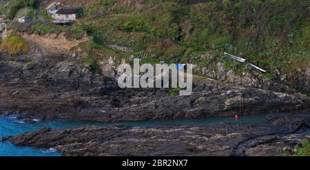 Prussia Cove, Porth-en-alls früher King's Cove genannt, ist ein kleines privates Anwesen an der Küste von Mount's Bay, West Cornwall, England Stockfoto