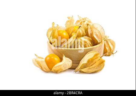 Kap Stachelbeeren in Holz Schale physalis auf weißem Hintergrund. Stockfoto