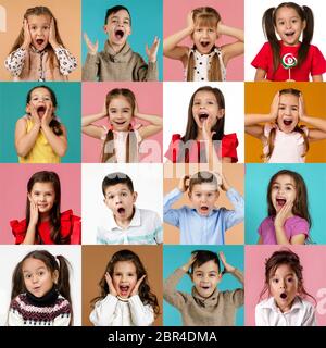 Collage aus glücklichen, überraschten Gesichtern von Kindern. Lächelnde Mädchen und Jungen, die verschiedene positive Emotionen ausdrücken. Menschliche Emotionen, Gesichtsausdruck Konzept. Stockfoto