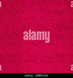 Abstrakter Hintergrund von roten trockenen Pulverfarbe. Stockfoto