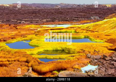 Schöne kleine Schwefel seen Dallol, Äthiopien. Danakil Depression ist die heißesten Ort der Erde in Bezug auf das ganze Jahr über Durchschnittstemperaturen. Es ist als Stockfoto