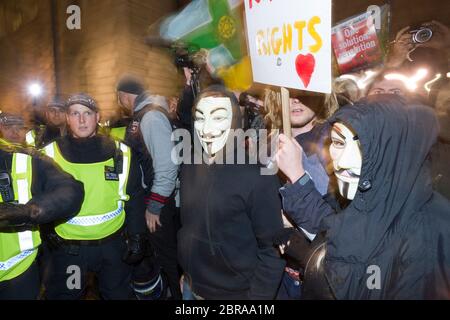 Auf dem "Millionen-Maske-Marsch" werden Proteste mit V-for-Vendetta-Stil Guy Fawkes Masken und Demonstrationen gegen Austerität, die Verletzung ziviler ri Stockfoto