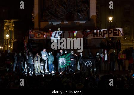 Auf dem "Millionen-Maske-Marsch" werden Proteste mit V-for-Vendetta-Stil Guy Fawkes Masken und Demonstrationen gegen Austerität, die Verletzung ziviler ri Stockfoto