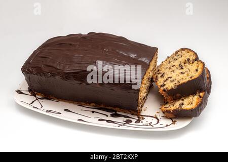 Schokoladenkuchen, Topfkuchen oder sogar Torte mit Schokoladensauce Stockfoto