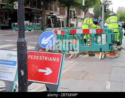 London, Großbritannien. Mai 2020. London Councils nutzen die Covid-19-Zeit, um Gehsteige zu reparieren und zu ersetzen. Kredit: Brian Minkoff/Alamy Live News Stockfoto