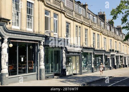 Reihe von exklusiven Geschäften in den Regency Gebäuden in der Montpellier Einkaufsviertel von Cheltenham Gloucestershire Großbritannien Stockfoto