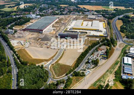 FLÄCHENMARKE 51░7 mit Logistikunternehmen DHL-Logistik auf dem Gelände des ehemaligen OPEL-Werks I in Bochum, Baustelle der neuen Autobahn A448, 10.04.2019, Luftaufnahme, Deutschland, Nordrhein-Westfalen, Ruhrgebiet, Bochum Stockfoto