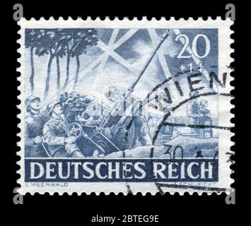Deutsche historische Stempel: Automatische gun Flak-30 Leichte Artillerie, Verteidigung der Wehrmacht, Memorial Day Ausgabe 1943, Deutschland Stockfoto