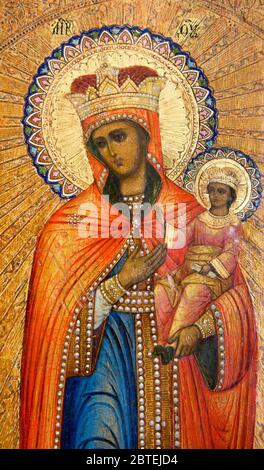 Byzantinische Ikone aus der Ukraine, genannt "Tröster der Bedrängten", die die heilige Maria, die Gottesmutter, mit der Hand auf ihr Jesuskind zeigt. Stockfoto