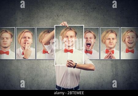 Junger Mann verschiedene Emotionen zum Ausdruck maskiert Stockfoto