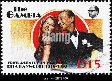 Fred Astaire und Rita Hayworth auf Briefmarke von Gambia Stockfoto