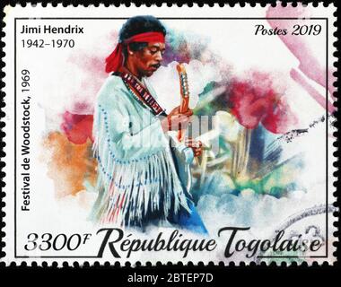 Jimi Hendrix im Konzert bei Woodstock auf Briefmarke Stockfoto