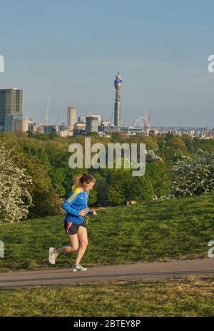 Joggen im Primrose Hill Park Stockfoto