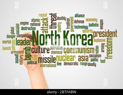 Nordkorea Wort Wolke und Hand mit Marker-Konzept auf weißem Hintergrund. Stockfoto