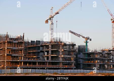 Bauarbeiten im Baugewerbe laufen auf der Baustelle Stockfoto