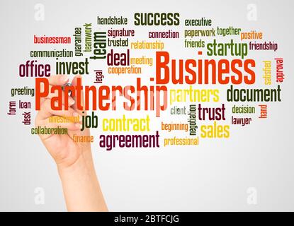 Business Partnership Wort Wolke und Hand mit Marker-Konzept auf weißem Hintergrund. Stockfoto