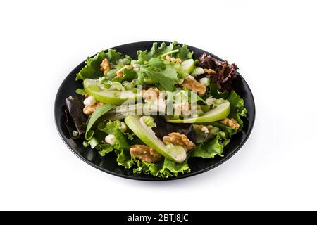 Frischer Waldorfsalat mit Salat, grünen Äpfeln, Walnüssen und Sellerie auf weißem Hintergrund isoliert Stockfoto