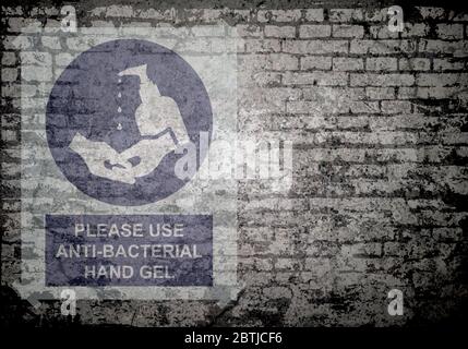 Grunge verfiel verblasste Backstein Wand Hintergrund mit bitte verwenden Sie antibakterielle Hand Gel Zeichen, um die Ausbreitung der weltweiten Pandemie zu stoppen Stockfoto