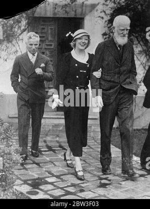 Charles Chaplin , jetzt verlobt Paulette Goddard , Mittagessen mit Herrn George Bernard Show 12 Dezember 1935 Stockfoto