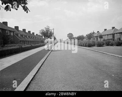 Val de travers, Straßenbau auf Becontree Avenue. Juli 1938 Stockfoto