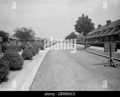 Val de travers, Straßenbau auf Becontree Avenue. Juli 1938 Stockfoto