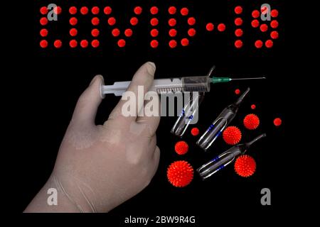 Ampullen mit Impfstoff COVID-19 Nahaufnahme. Hand in einem medizinischen Handschuh mit der Spritze auf der Hand isoliert auf einem schwarzen. Verstreute Orangenviren und die in Stockfoto