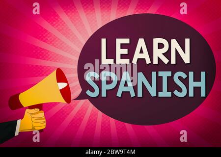 Schreibnotiz, der Spanisch lernen zeigt. Business-Konzept für das Schreiben und Sprechen der Landessprache von Spanien Hu Analyse Hand Holding Megapho zu trainieren Stockfoto
