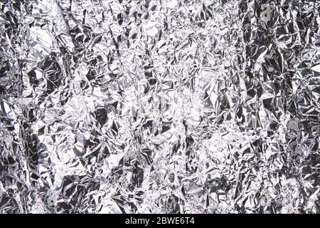Folie Aluminium zerkleinert Textur. Hintergrund aus Metallmaterial Stockfoto