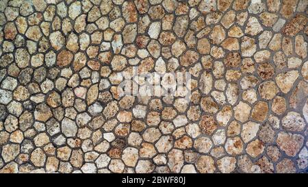 Textur einer Mauer aus altem Baustein Stockfoto