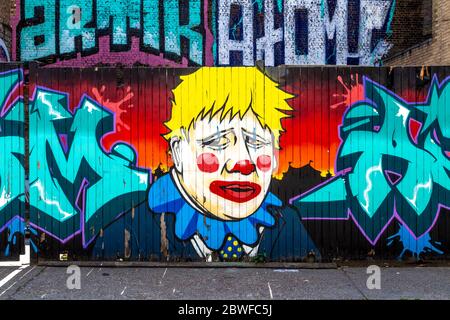 Wandbild von Boris Johnson als Clown von Ante ltd in Fashion Street, Spitalfields, London, Großbritannien Stockfoto