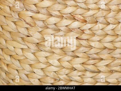 Natürliche strukturierte Hintergrund von hellen farbigen gewebten Gras Typ Material Stockfoto