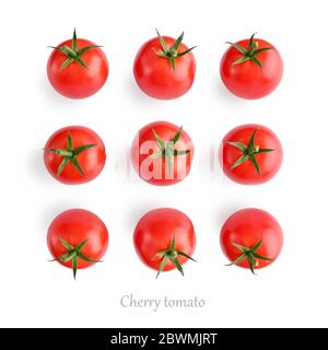 Frische rote Kirschtomaten auf weißem Hintergrund isoliert, Draufsicht. Stockfoto