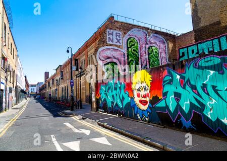 Wandbild von Boris Johnson als Clown von Ante ltd in Fashion Street, Spitalfields, London, Großbritannien Stockfoto