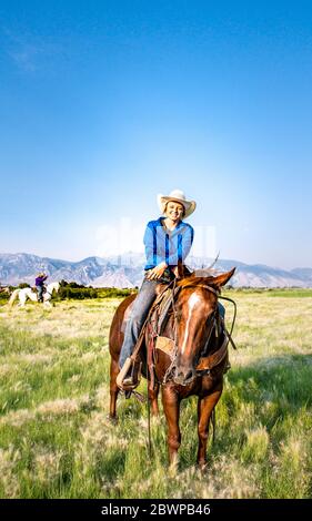 Cowgirl auf der Ranch Stockfoto