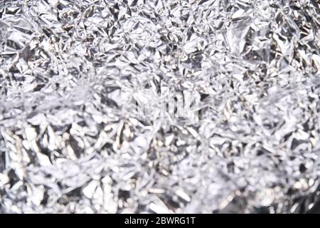 Folie Aluminium zerkleinert Textur. Hintergrund aus Metallmaterial Stockfoto