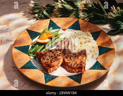 Schweinebäcken In Burgund-Orange Stockfoto