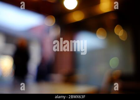 Abstrakt verschwommen Bokeh von Coffee Shop Hintergrund. Stockfoto